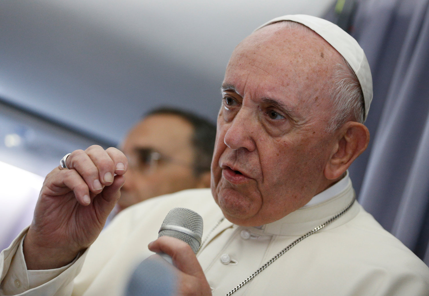 Pope Francis answers questions from journalists aboard his flight from Sibiu, Romania, to Rome June 2, 2019.